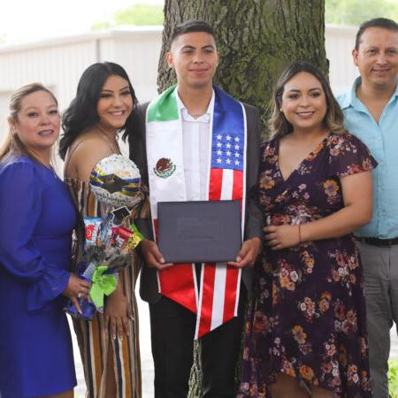 KWU student with family at graduation